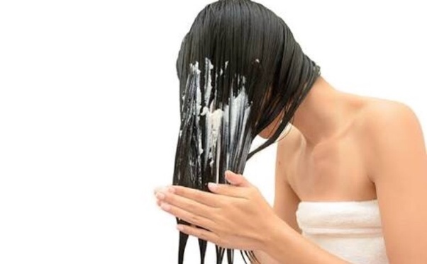 Apply conditioner hair with tape in extensions