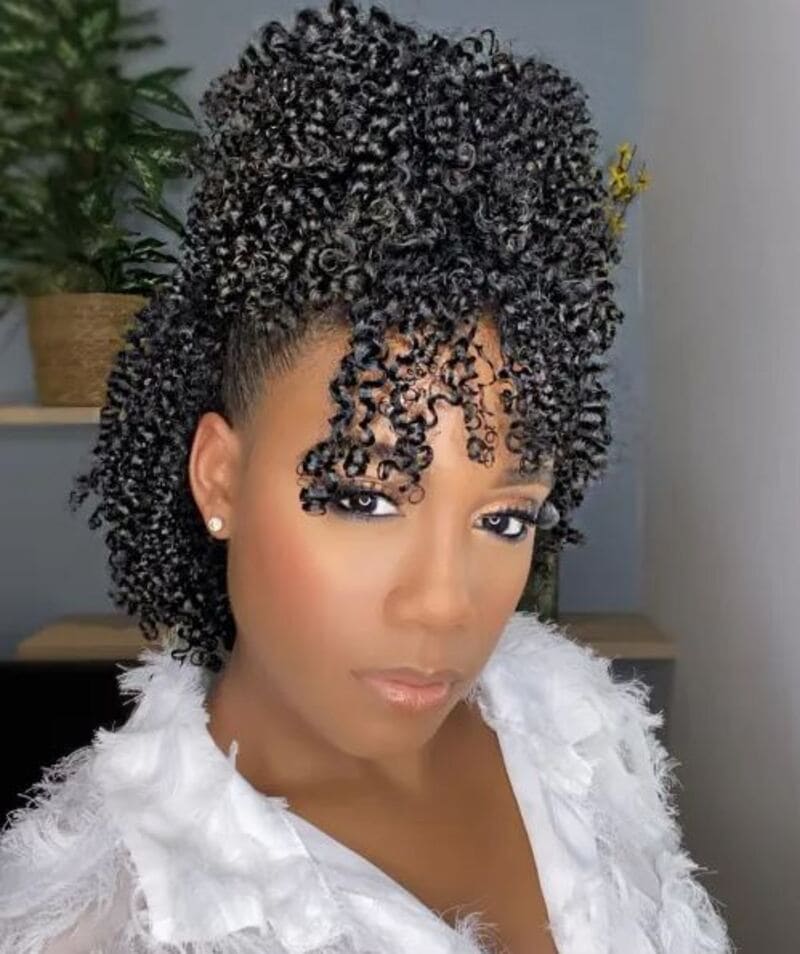 This is an alternative half up half down black hairstyle. (Source: The Right Hairstyles)