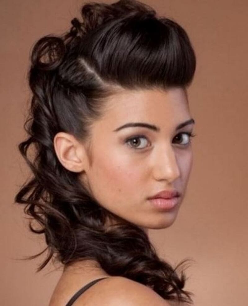 Half-up, half-down hairstyles for curly hair can be stunning. (Source: Careforhair)