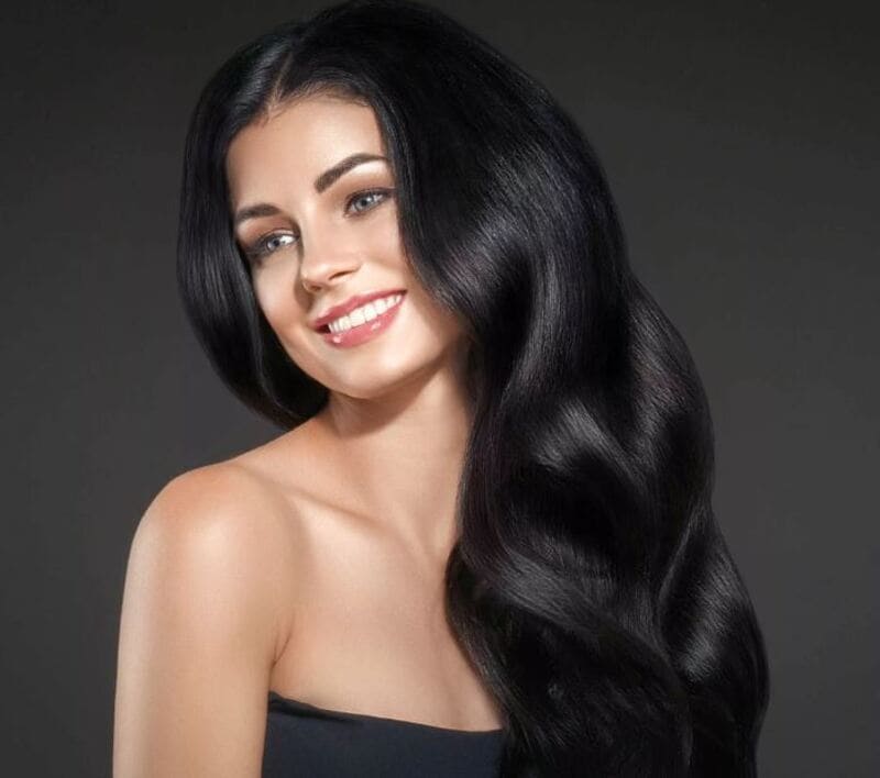 Black hair is known for its natural strength, thickness, and versatility. (Source: Renew Hair Colour)