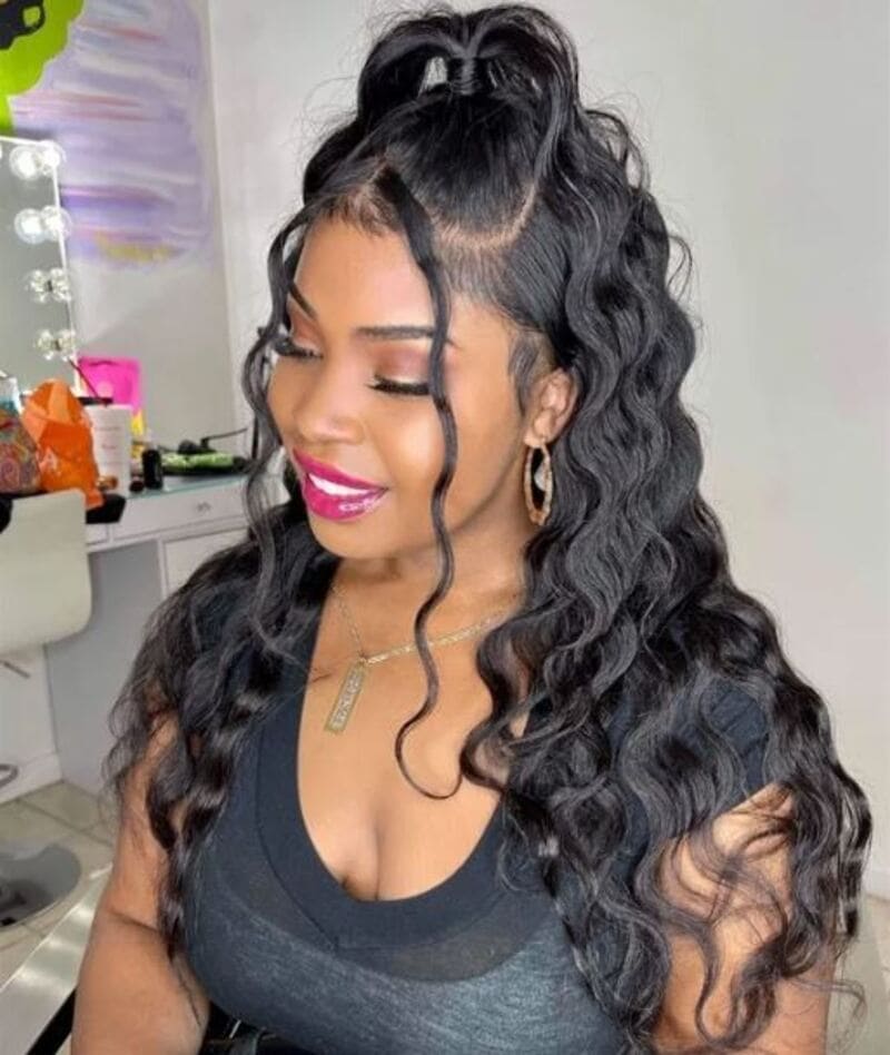 The half-up, half-down sew-in is a fantastic choice for achieving the perfect balance between sophistication and glamour. (Source: Donmily Hair)