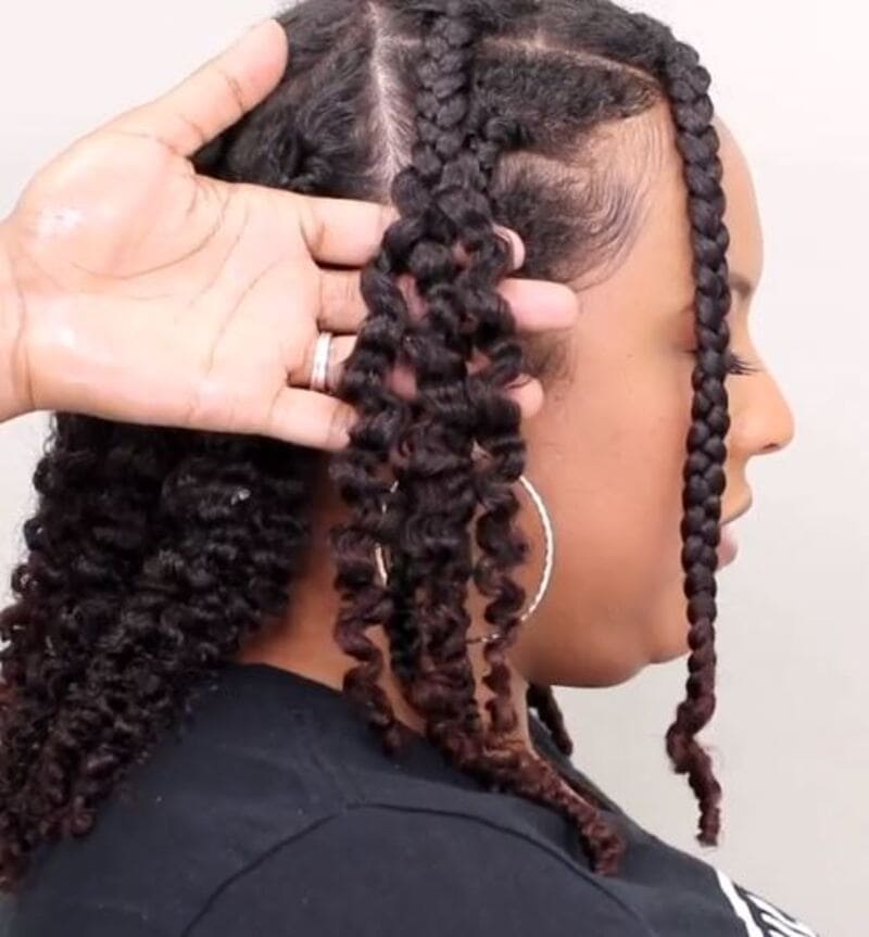 It is time to remove the buns and unravel the braids of your braid-out hairstyle. (Source: Miche Beauty)