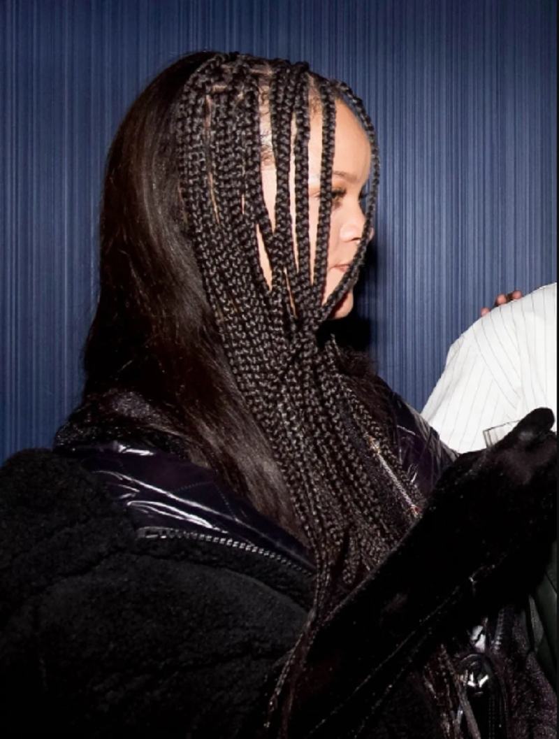 The stunning half braided and sew-in hairstyle of Rihanna (Source: Vogue)