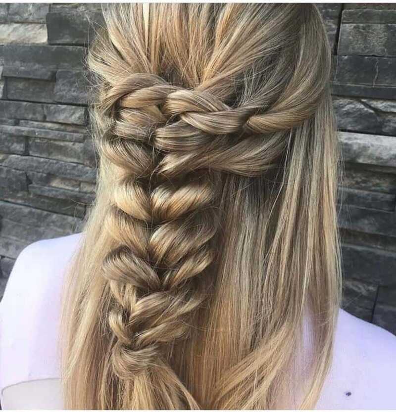 Braid it your way: Effortless charm meets intricate details in a braided half-up, half-down style (Source: Instagram @fiftieth.avenue.cuts)