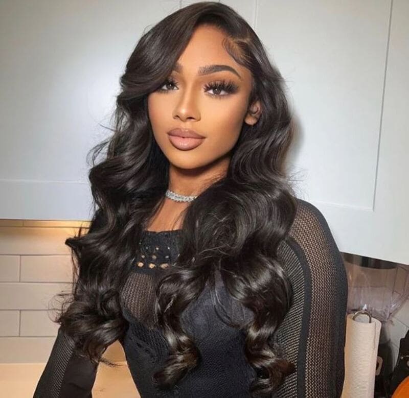 Side part closure sew-in using body wave hair that adds a touch of glamour and femininity. (Source: ocean property)