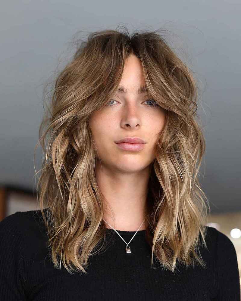 This adds a playful and dynamic element to the overall look (Source: Latest Hairstyle)