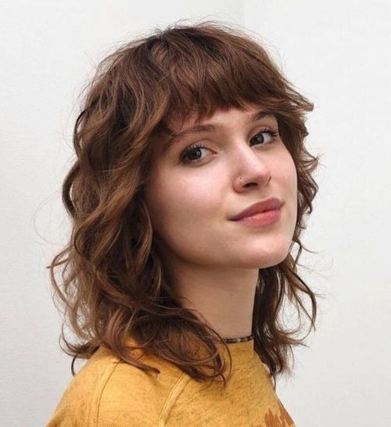 Big shaggy curls bring a captivating vibe to your look. (Source: Pinterest)