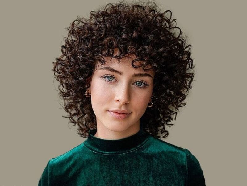  For a sleeker look, leave the curls in larger, more defined clumps. (Source: Latest-Hairstyles.com)