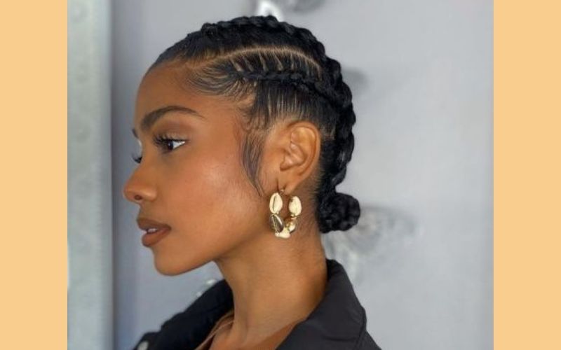 Braided side bun with deep wave sew in hairstyles (Source: Pinterest)