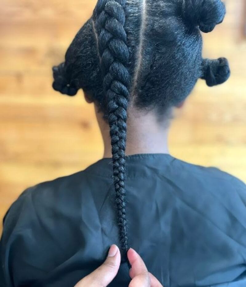 Secure the ends of your hair by braiding them together in a traditional manner. (Source: Popsugar)