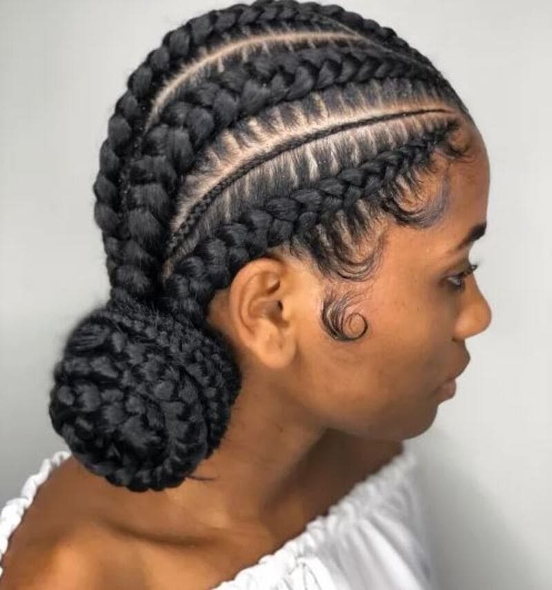 Cornrows braided into a bun is a great option to manage the lengthy cornrow strands. (Source: The Right Hairstyles)