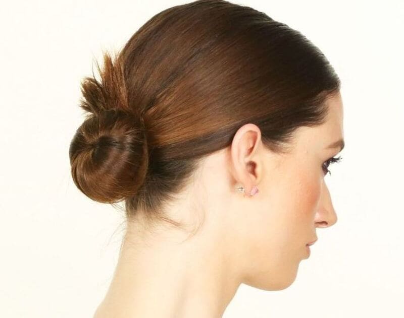 Put your hair in a bun to achieve a tidy and secure fit. (Source: Pinterest)