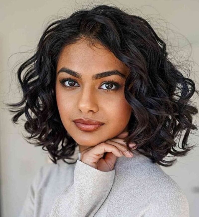 The curls add texture and movement for a soft and romantic look. (Source: Latest-Hairstyles.com)