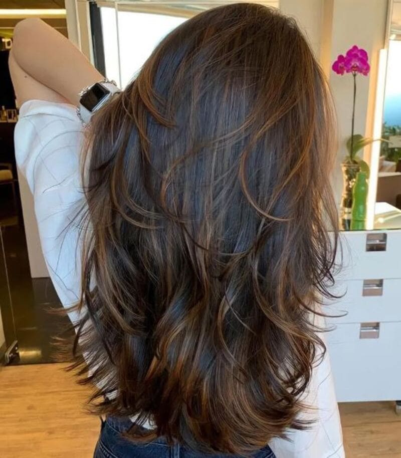 Gradual layering works well for thick layered long hair. (Source: Limelite salon)