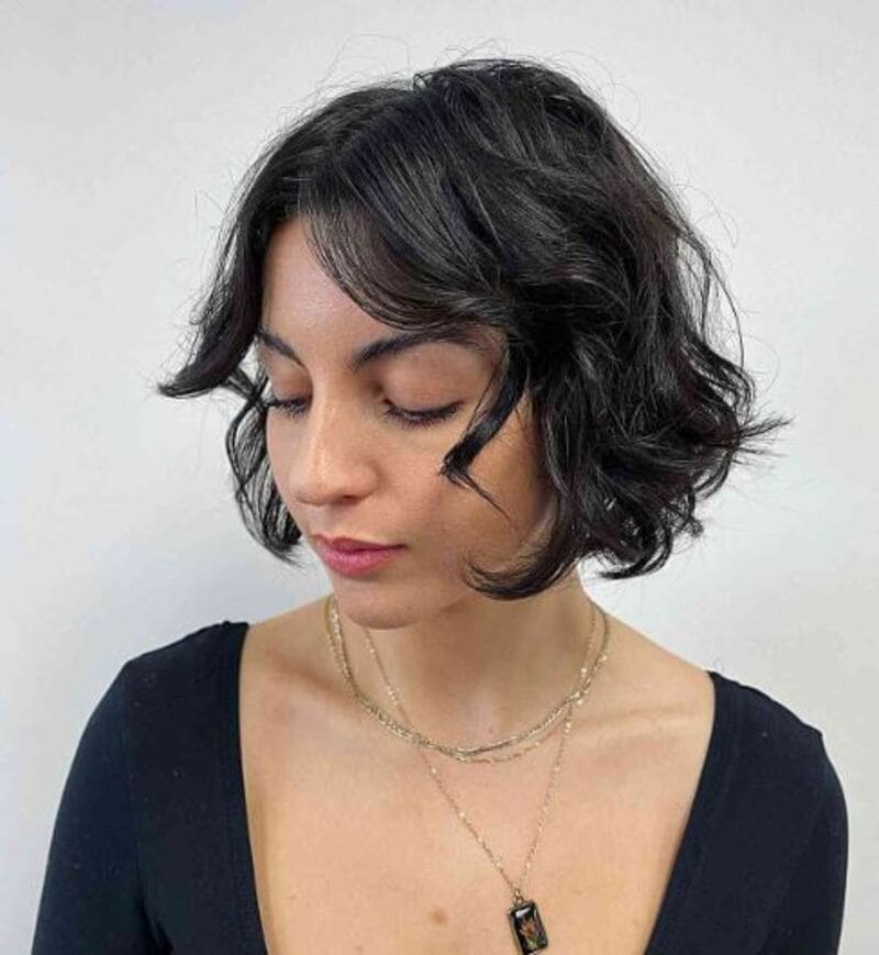 A curly French bob celebrates texture and adds a playful, romantic touch. (Source: Latest-Hairstyles.com)