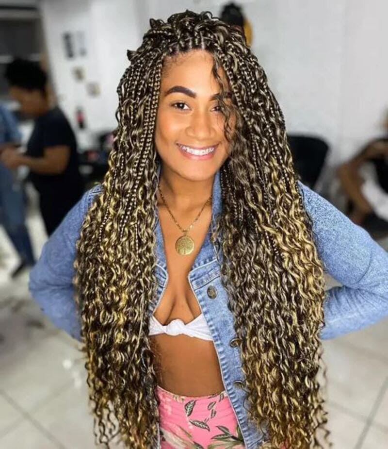 By incorporating weave into your blonde box braids, you can achieve added length and volume. (Source: ocean property)