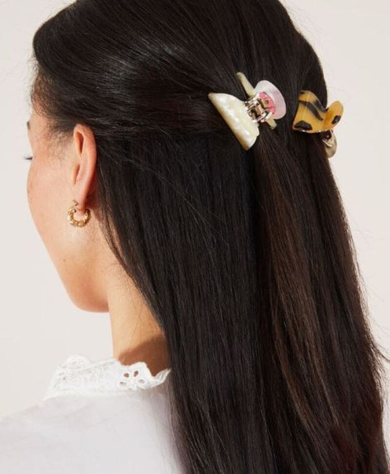 With just two mini clips, you can elevate your look and add a touch of dimension to your hair. (Source: Accessorize)