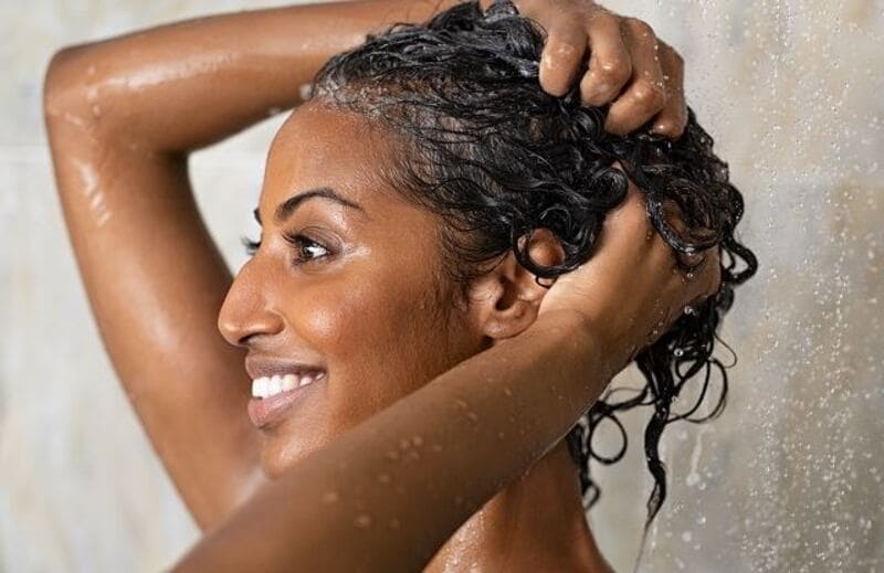 Start by washing your straight hair with a gentle sulfate-free shampoo and conditioner. (Source: BigG Hair Extensions)