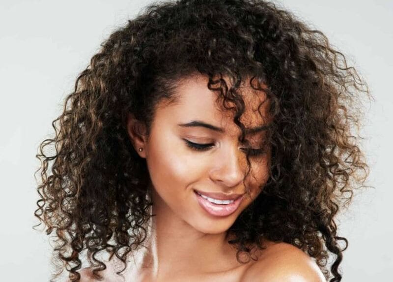 Curly hair tends to be drier, so it's important to keep your sew-in weave hydrated. (Source: StyleSeat)