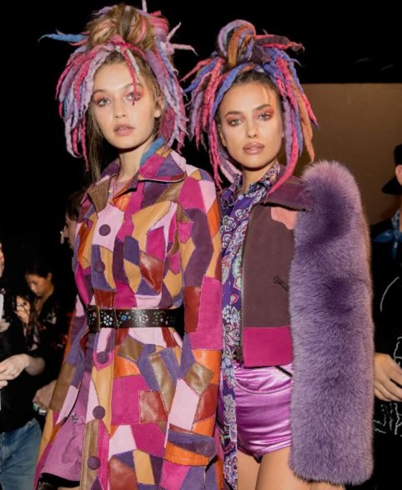 Rainbow-colored dreads incorporate all the vibrant hues of the rainbow for a bold and eye-catching style. (Source: Vogue)