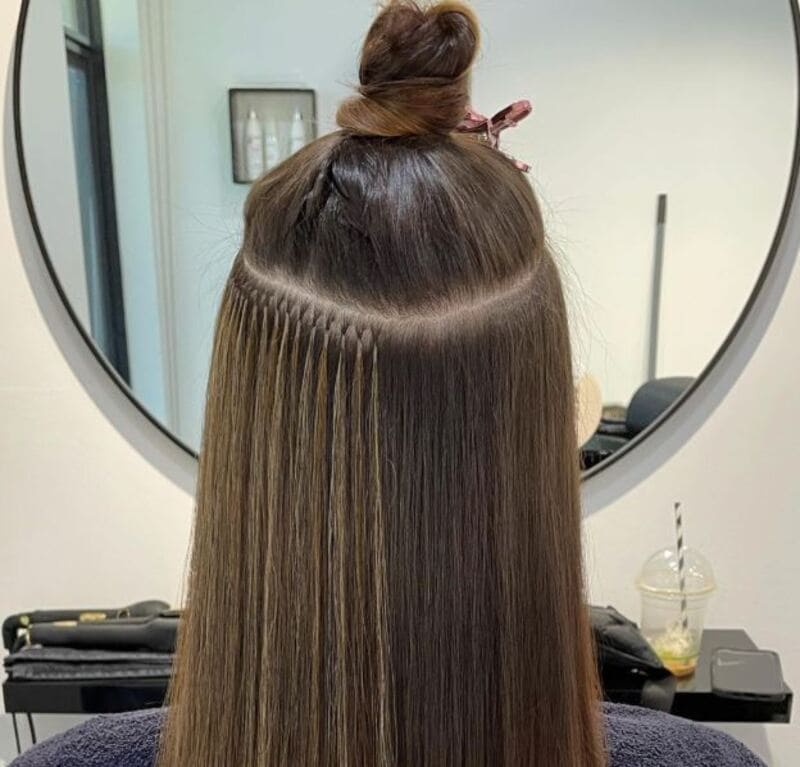 Each hairpiece of Keratin extensions has pre-installed glue at the tip, which is used to attach it to your own hair. (Source: Great Lengths)