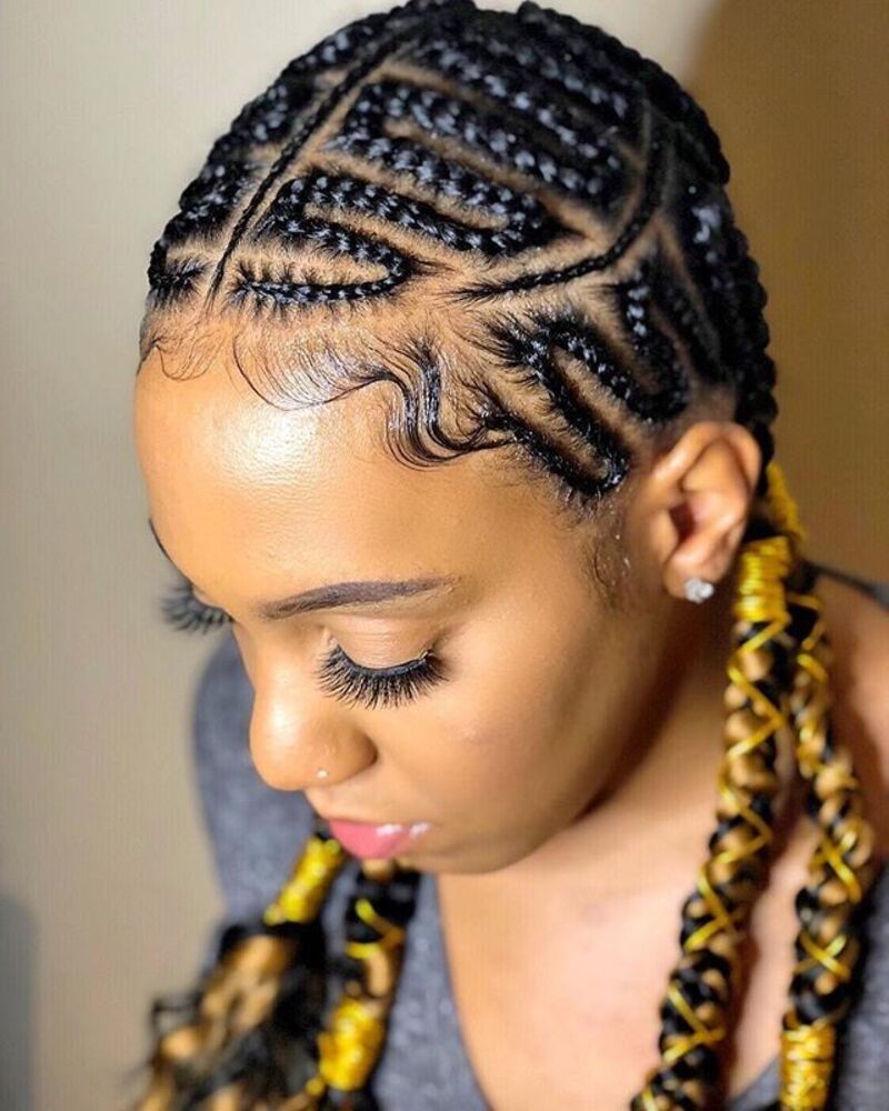 This design showcases cornrows weaving in a zig-zag motion (Source: Hali Beauty)