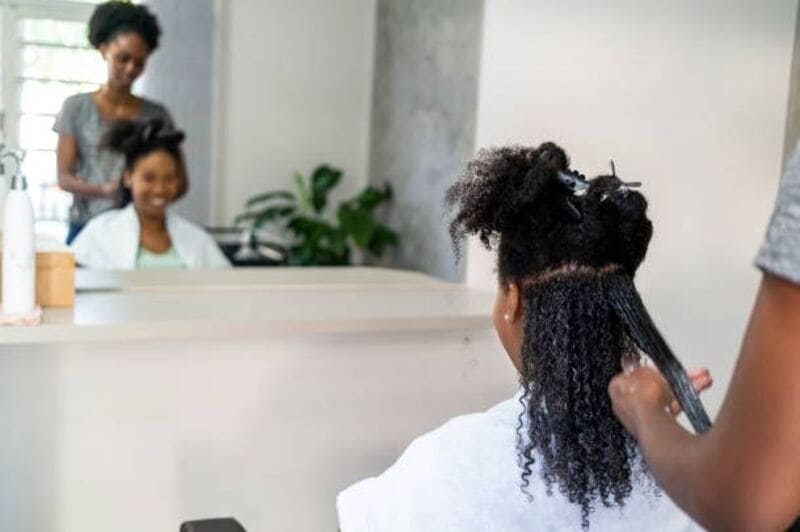 A hair relaxer permanently straightens your hair by eliminating its natural curl pattern. (Source: Ms. Roberts Beauty Academy)