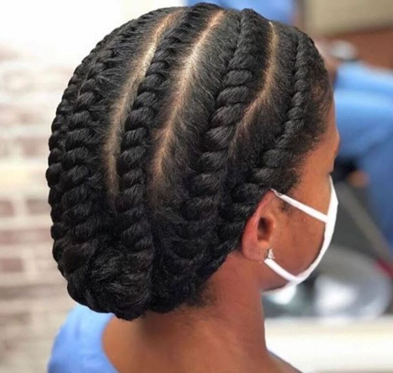 Flat twists perform like a two-strand twist, but they keep the twisting close to the scalp. (Source: Nathalieguimbretiere)