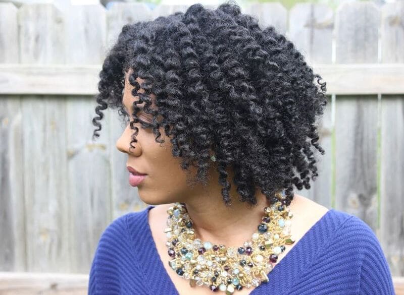 You create two or three-strand twists on damp hair and allow them to fully dry to create a twist out. (Source: Mielle Organics)