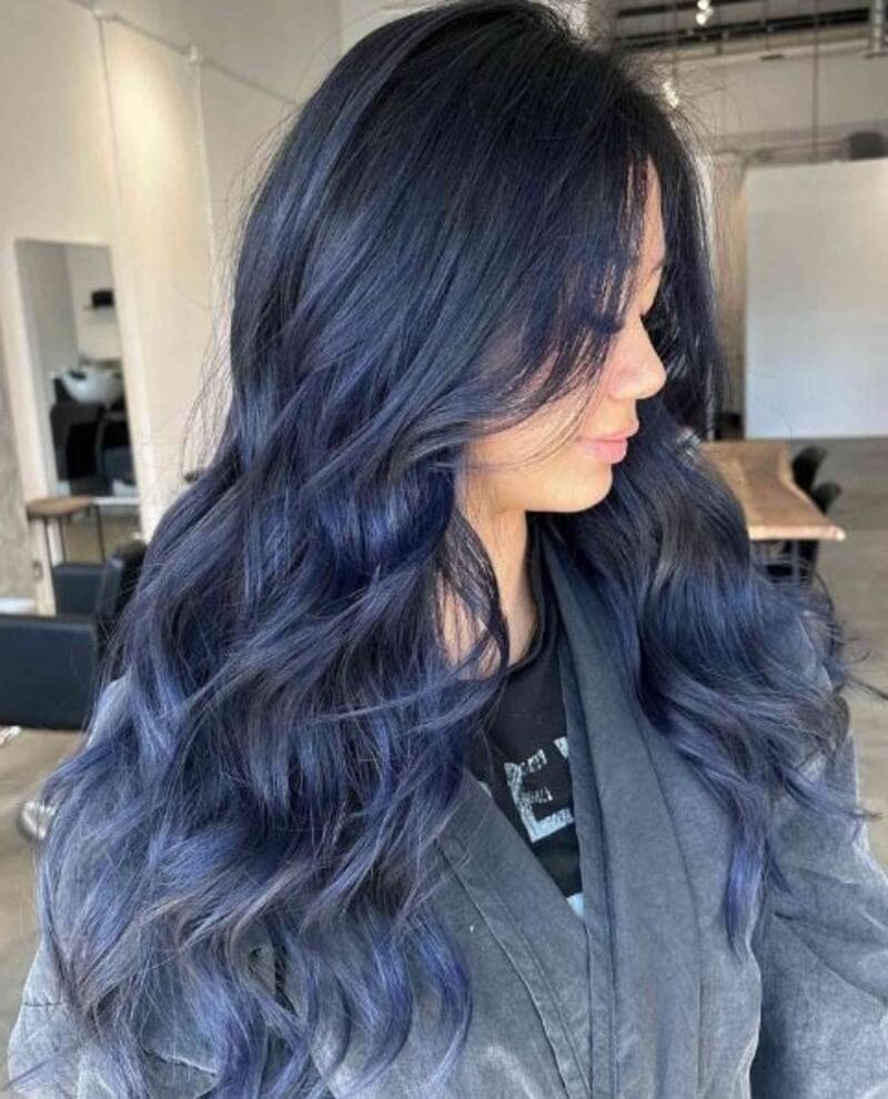 Not all blue shades will show up on dark hair, so select a dye specifically formulated for your natural hair color. (Source: Byrdie)