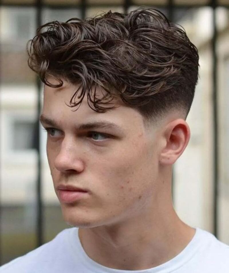 The natural texture of wavy hair makes it highly desirable for more movement and volume. (Source: Men's Hairstyle Tips)