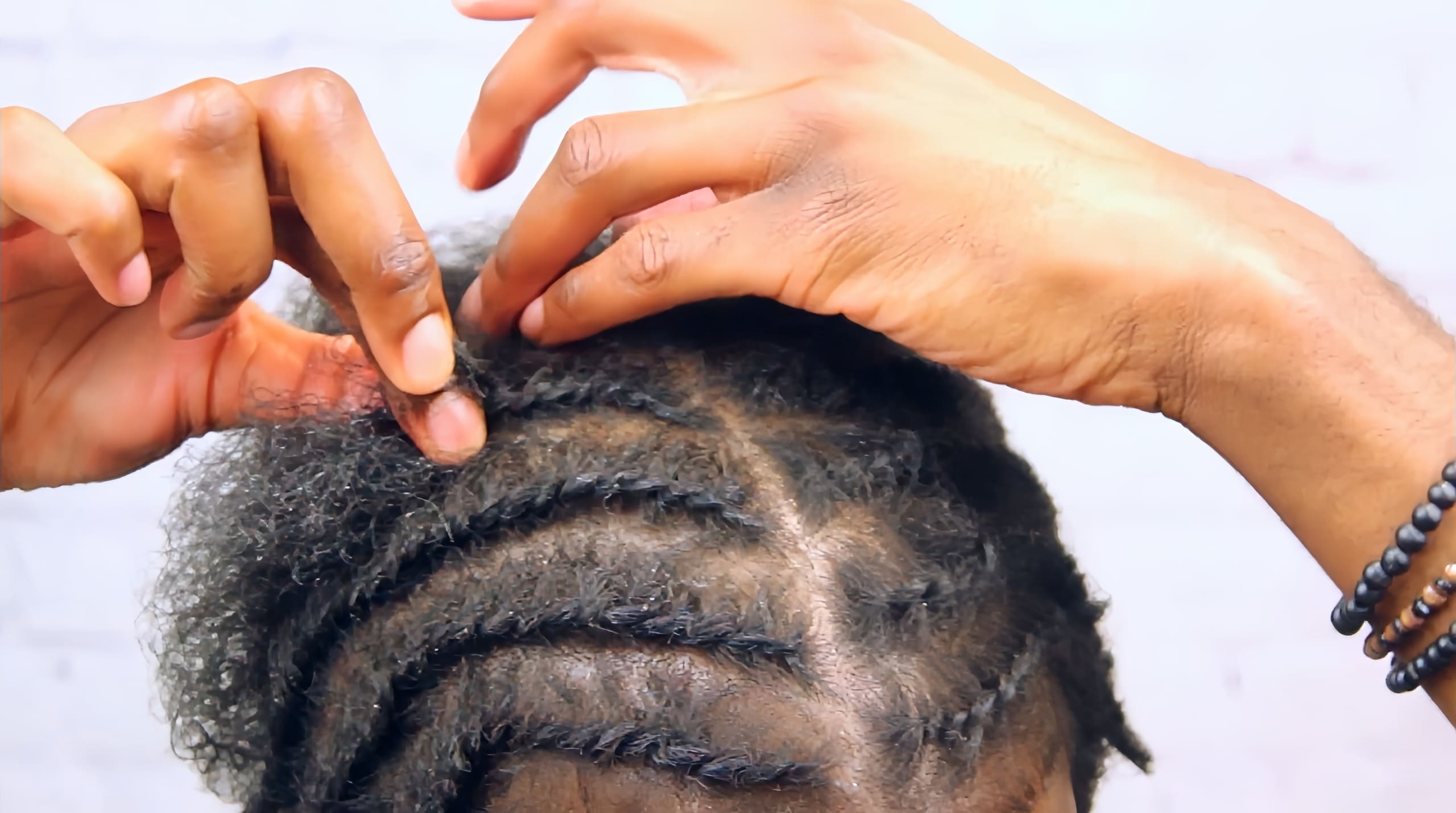 Flat twists on short natural hair (Source: Youtube @Felipé Charming)