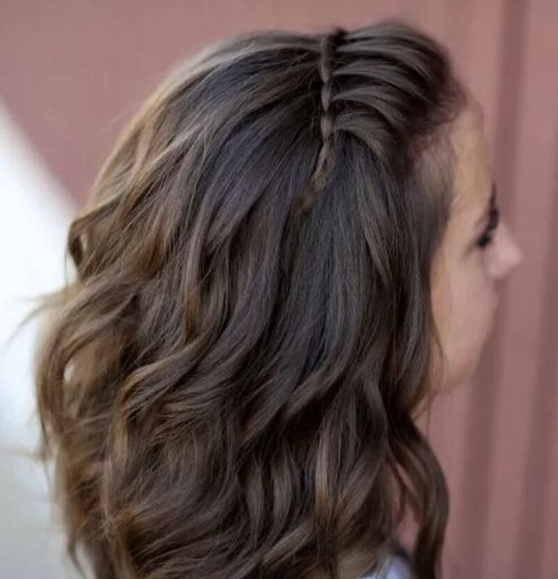 These braids add a touch of charm and femininity to the overall look. (Source: The Right Hairstyles)