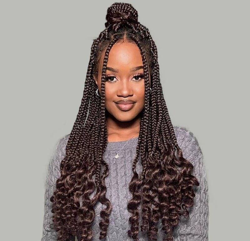 Goddess braids with curls mix the neat elegance of goddess braids and the romantic, soft look of curled hair ends. (Source: Latest-Hairstyles)