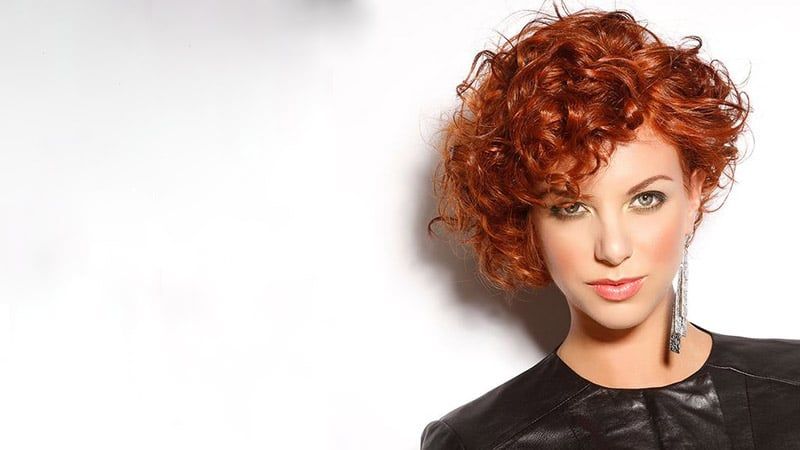 Asymmetrical curly bob hair