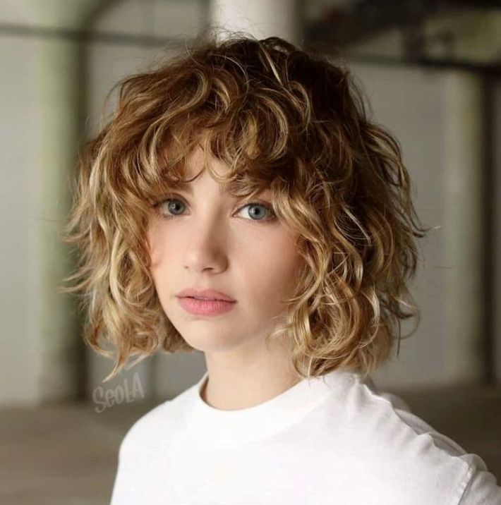 Curly bob with bangs