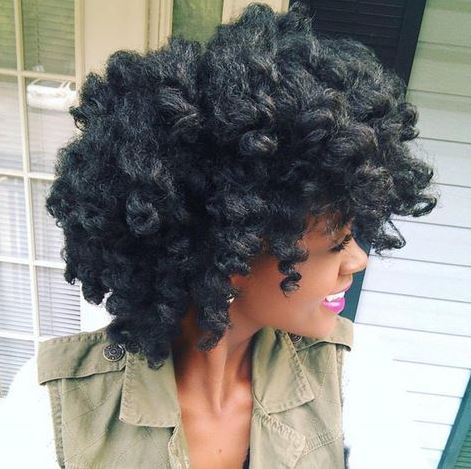 This unique Nigeria kiko hairstyle incorporates both a flat twist out and a regular twist out. (Source: Black hair tribe)