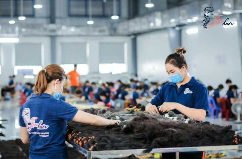 Workers at Jen Hair factory. 