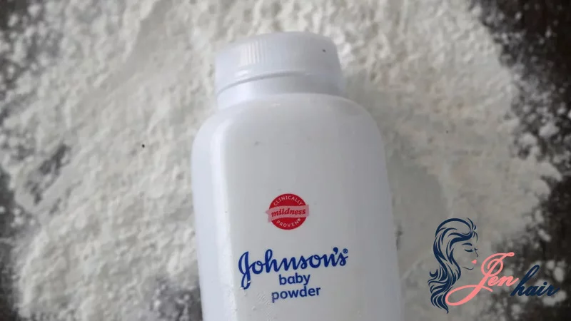 Sprinkle a small amount of baby powder onto your palms or directly at your roots.