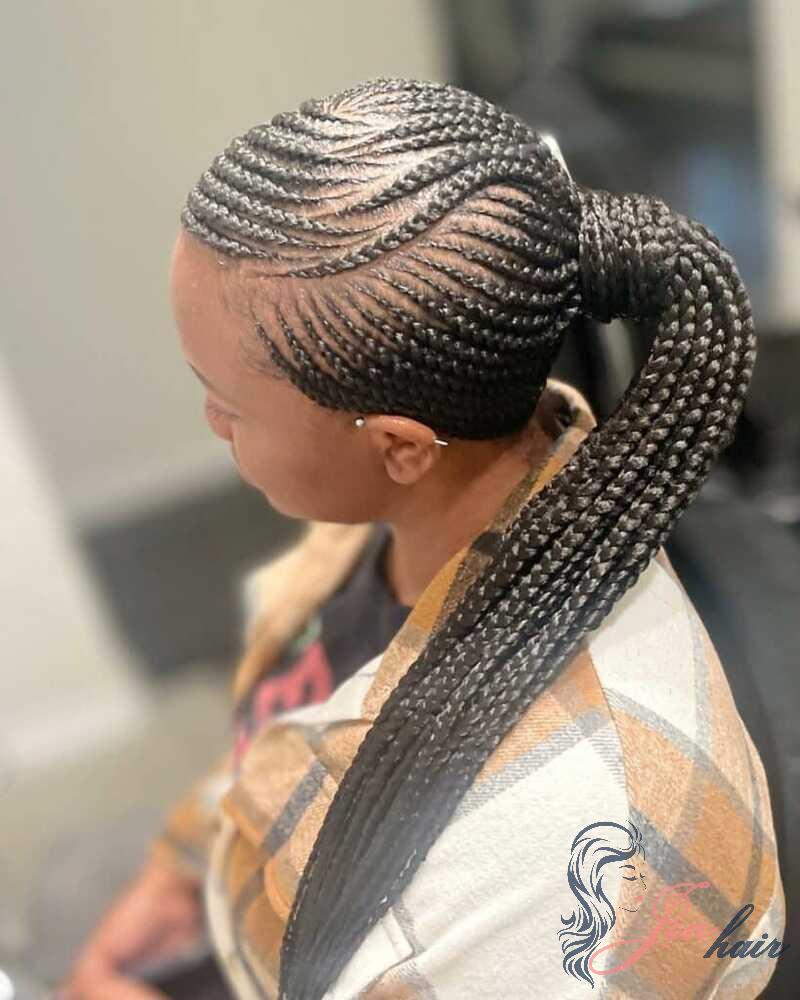 The low braided ponytail on the side is legendary