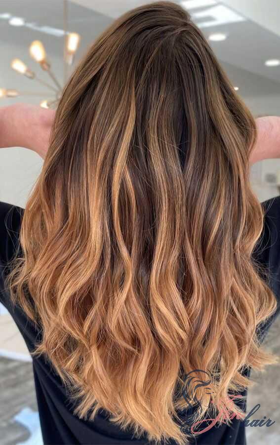 Warm balayage adds dimension to natural hair